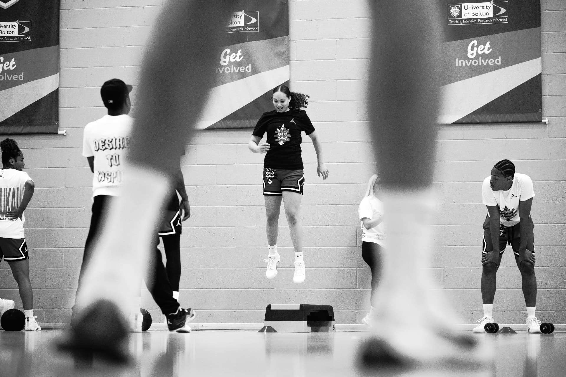 Players warming up together during the 2025 Why Not I Workout