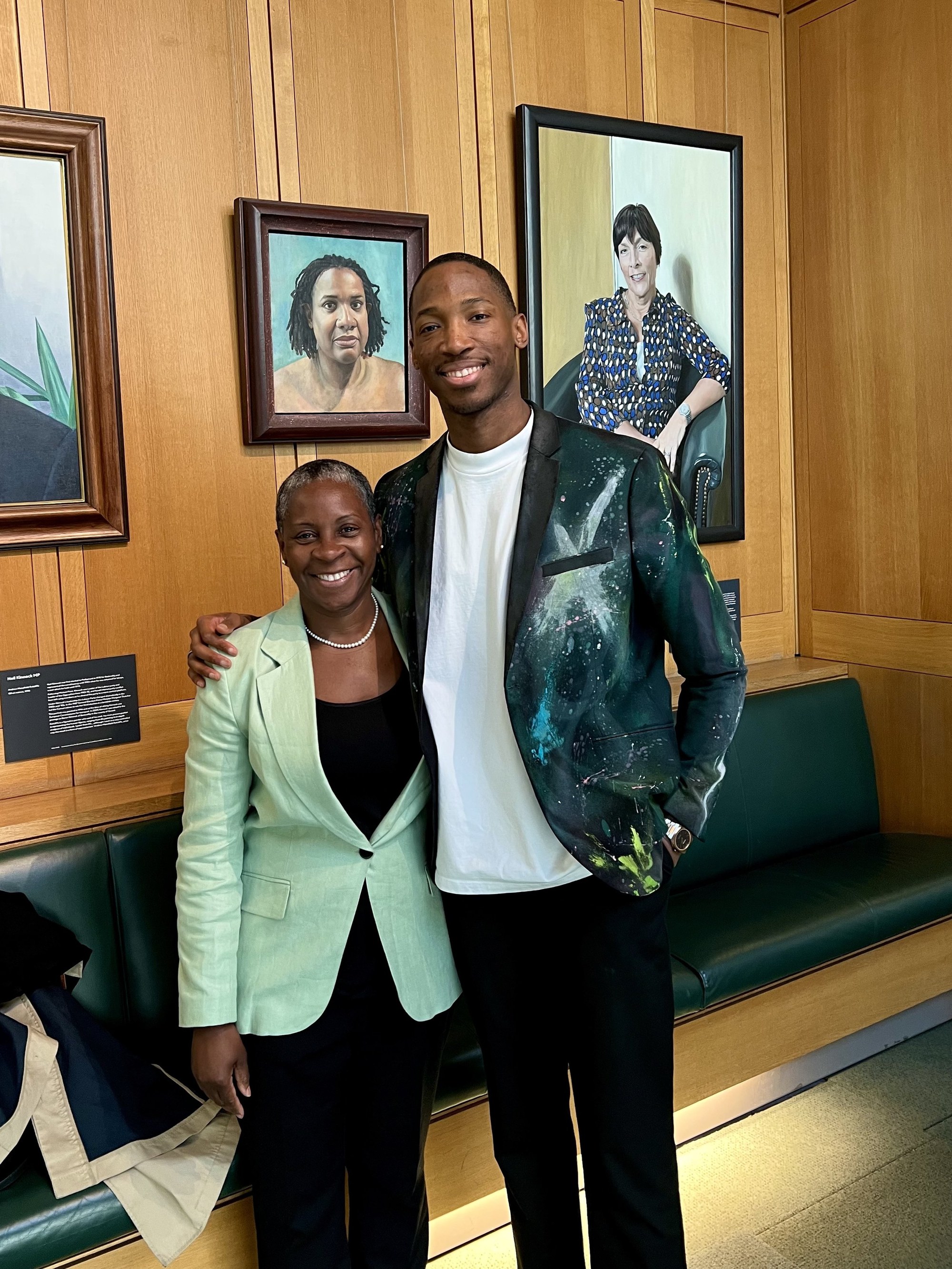Kofi Josephs with another contributor inside the Houses of Parliament