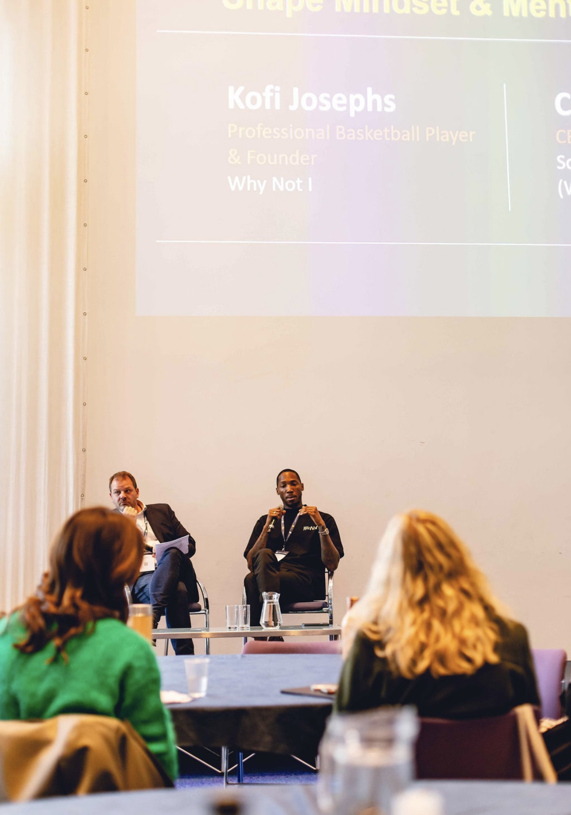 Kofi Josephs speaking as part of the fireside conversation hosted by Chris Cummings