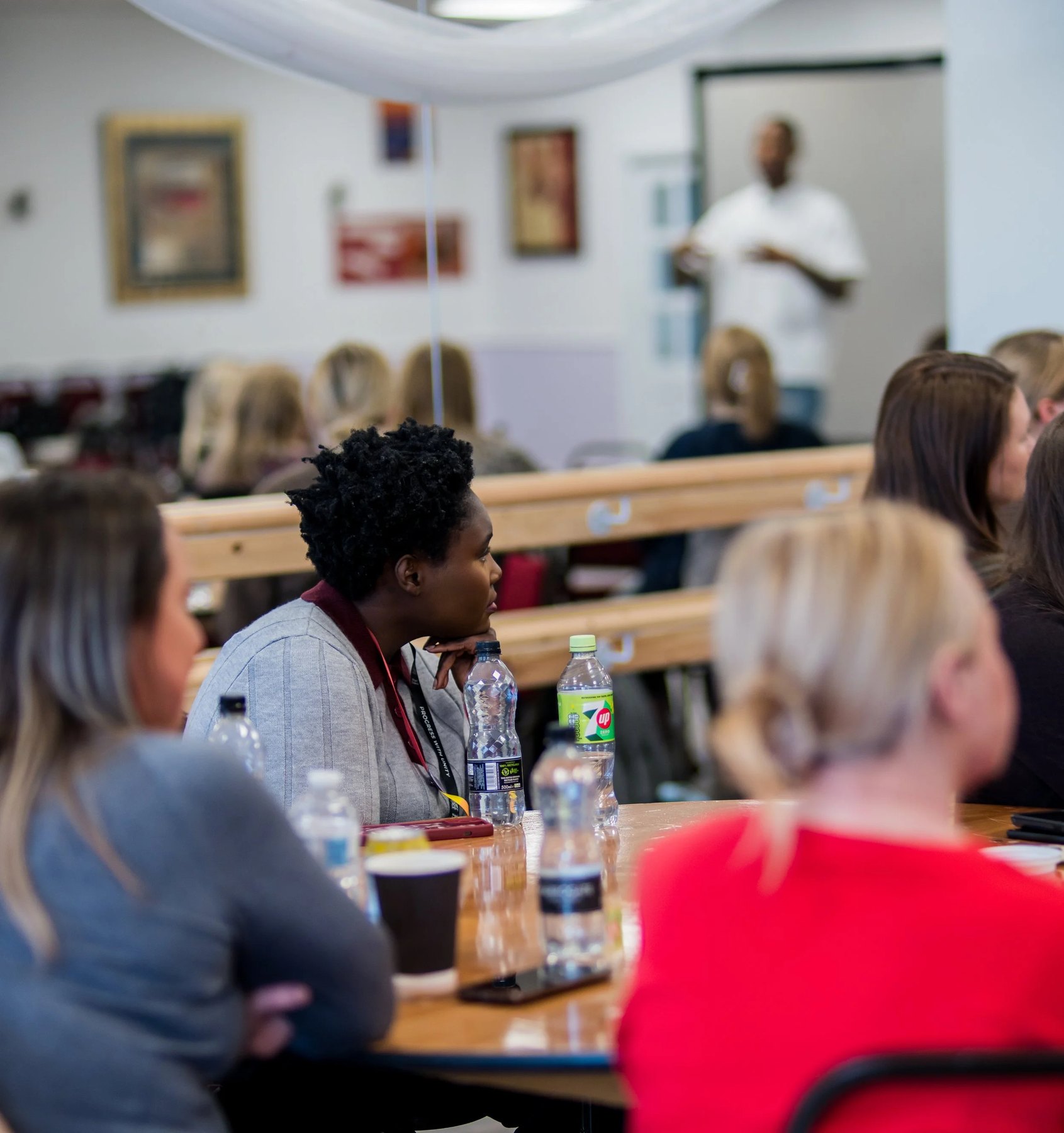 Attendees seated at tables during Kofi Josephs’s Wigan Council keynote