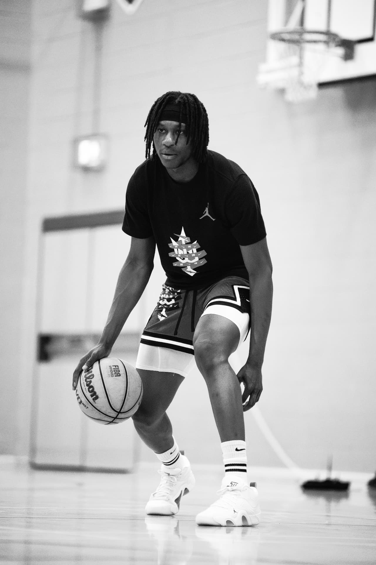 A participant working on a ball-handling drill at the 2025 Workout