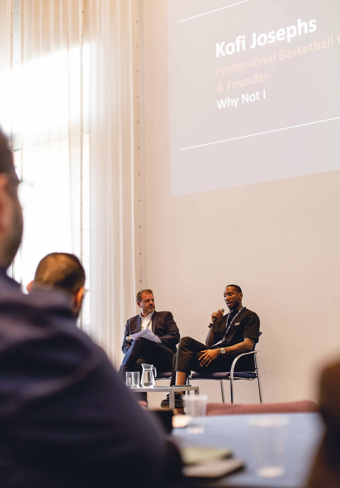 Kofi Josephs responding during the fireside conversation hosted by Chris Cummings