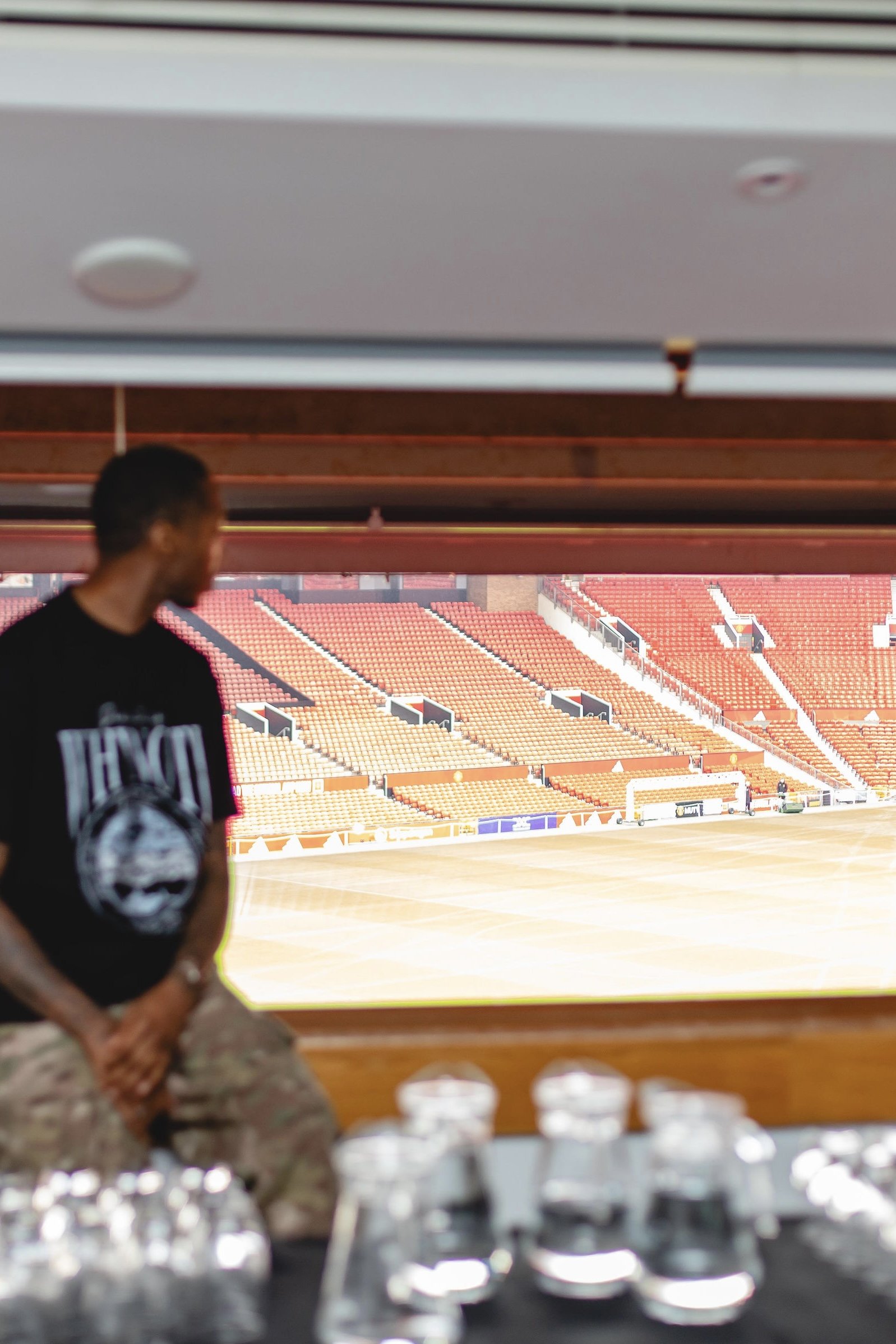 Kofi Josephs looking across the Old Trafford stands during the engagement visit